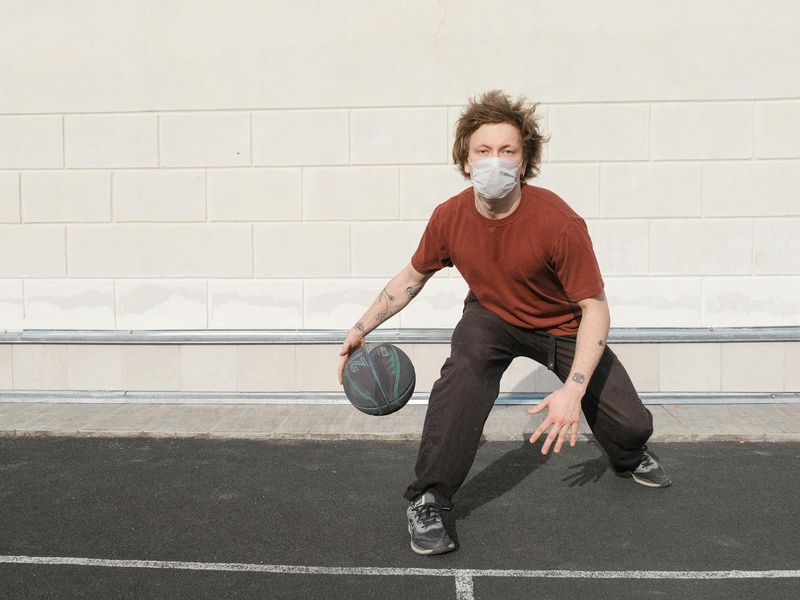 Focus on sports equipment and floor during a session.